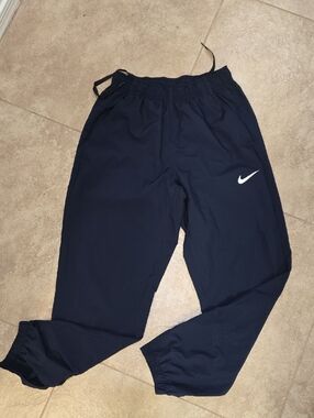 Nike Navy Track Pants with White Swoosh Accent